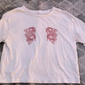 White T-shirt with design on it